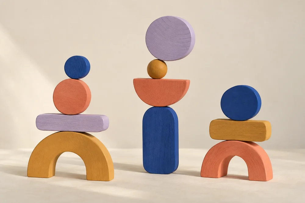 Generated painted wooden sculptural forms in lilac, coral, cobalt and ochre, with soft studio shadows.